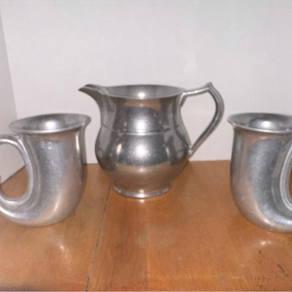 Wilton pewter pitcher and 2 matching Wilton mugs.